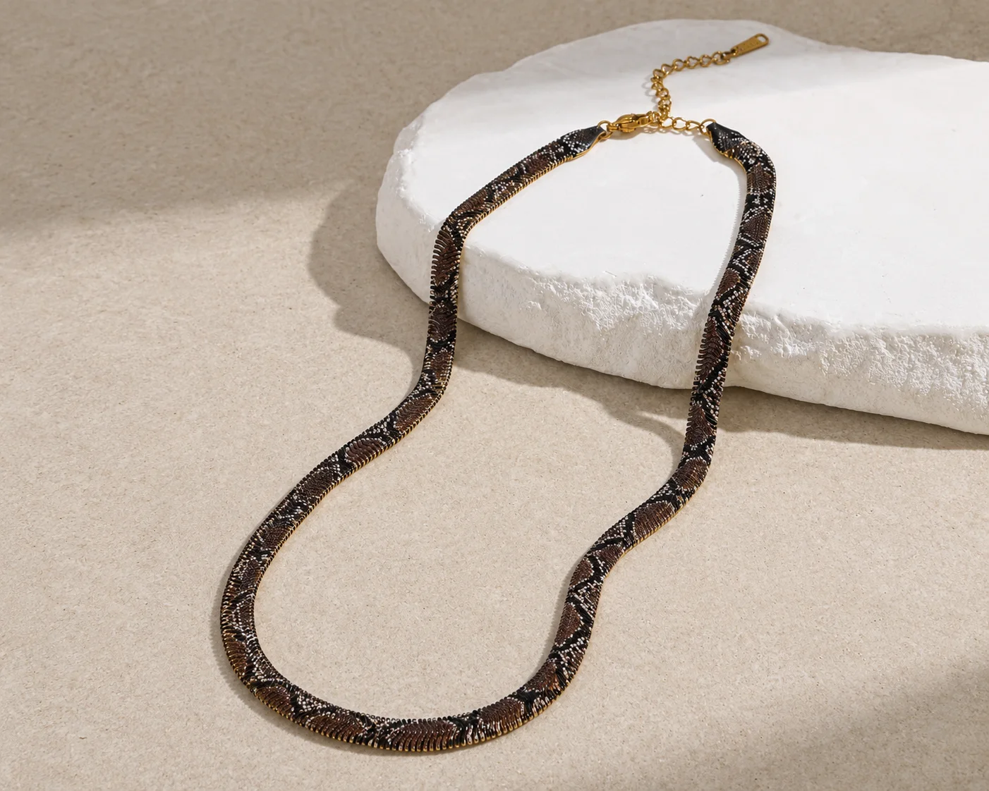 BRAIDED SNAKESKIN NECKLACE