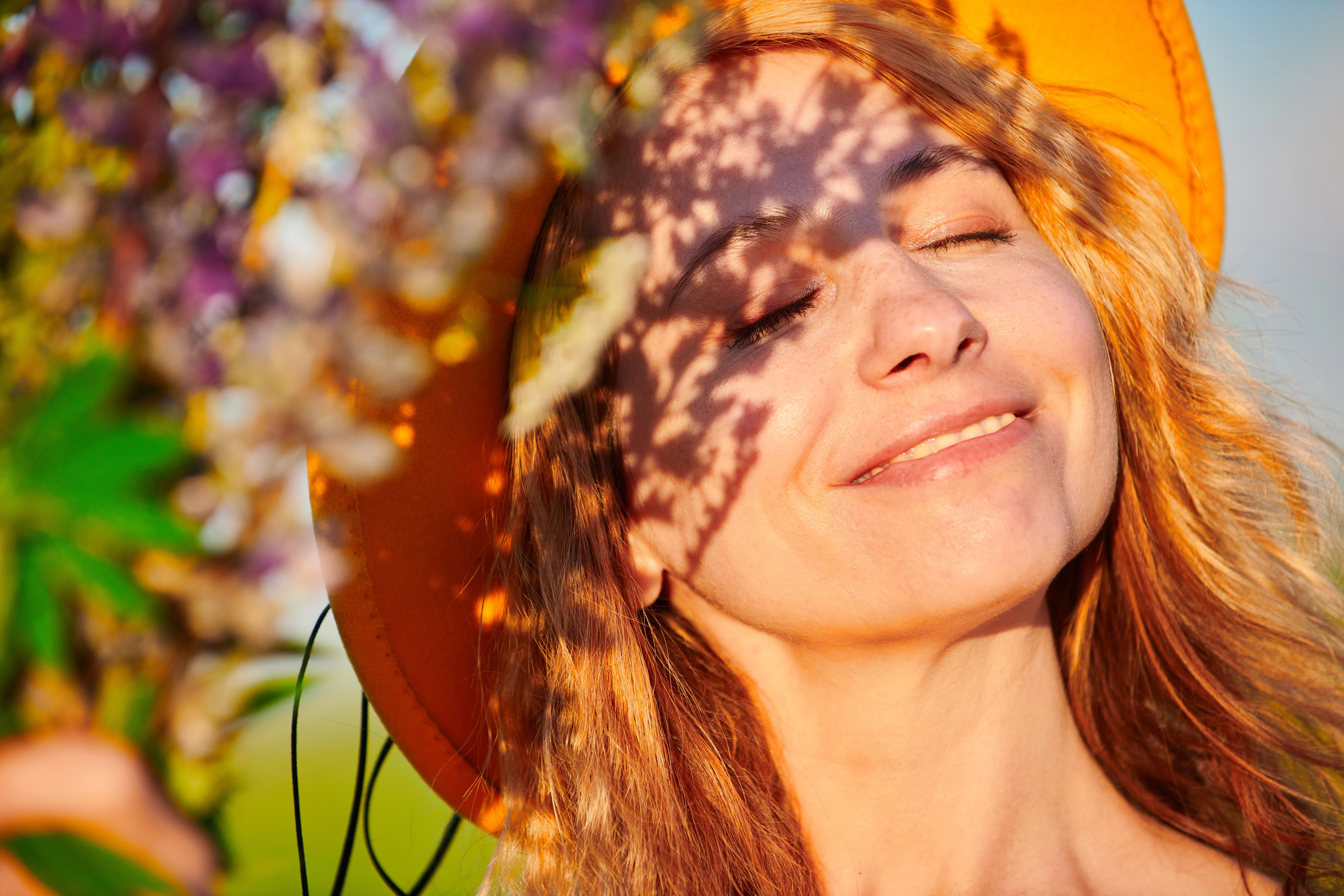 Femme au soleil en été — vitamine D3 carence estivale Nuvaya Shop