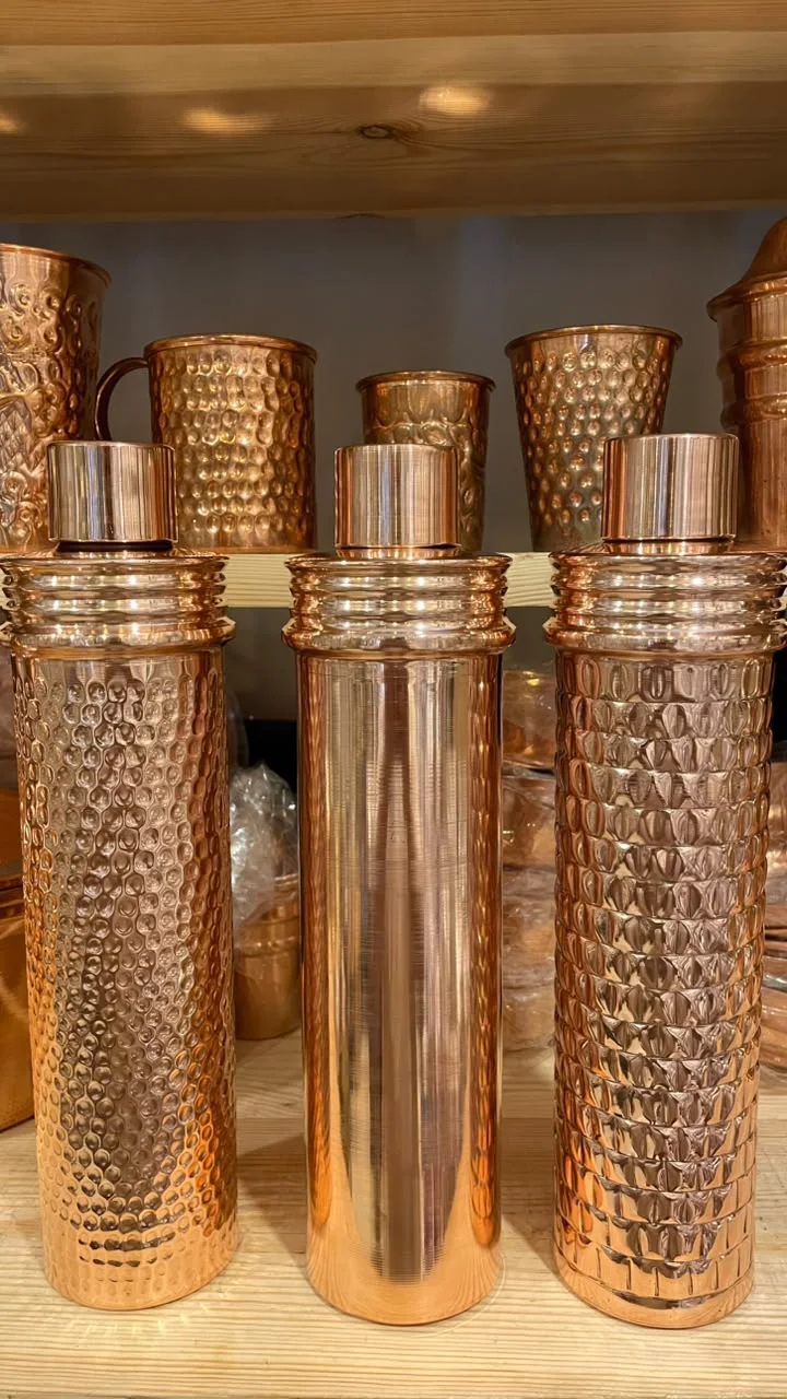 زجاجه مياه نحاس احمر  ( صغيره /كبيره /الساده /النقش ) (جمله)