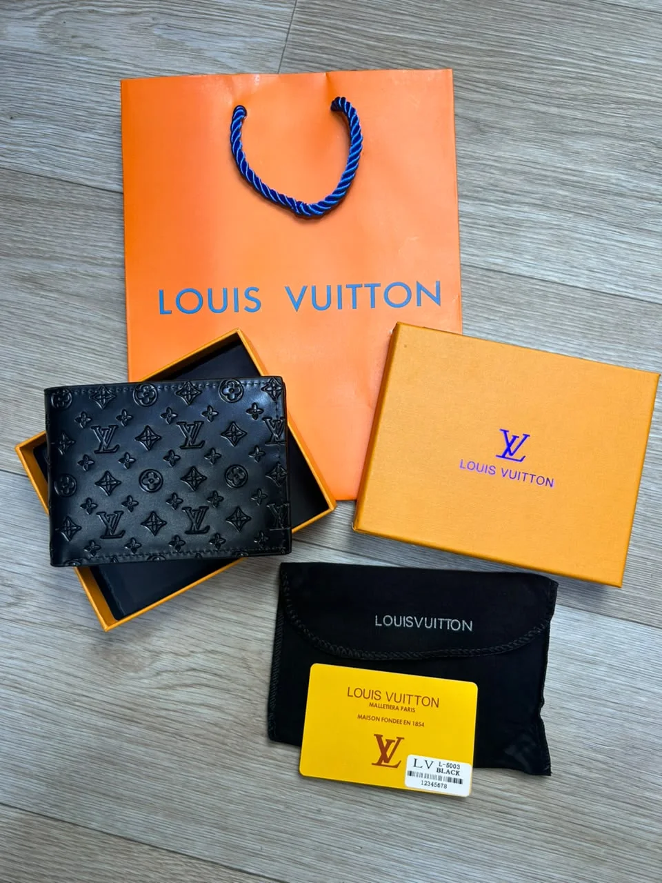 PORTE MONNAIE HOMMES LV