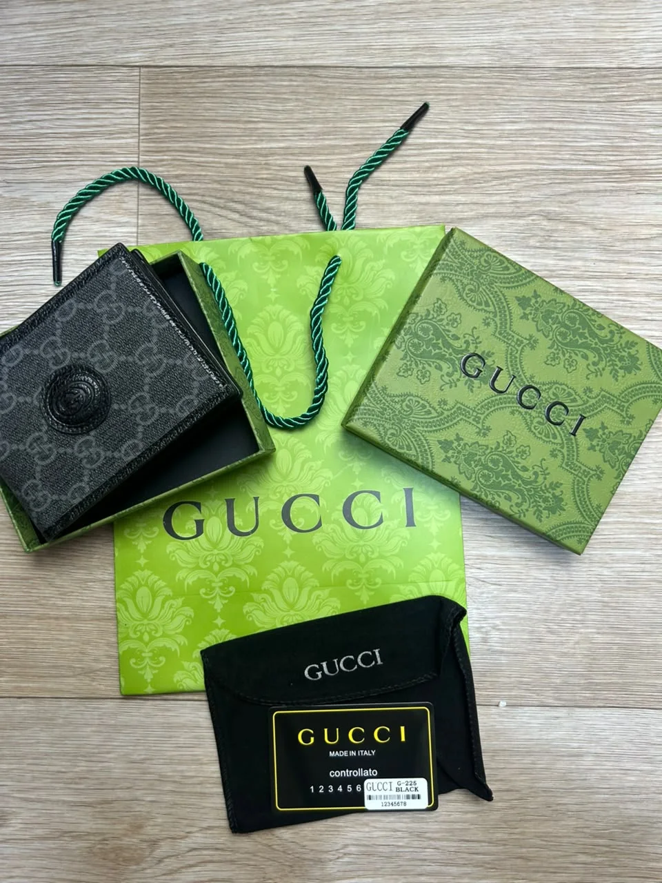 PORTE MONNAIE GUCCI HOMMES