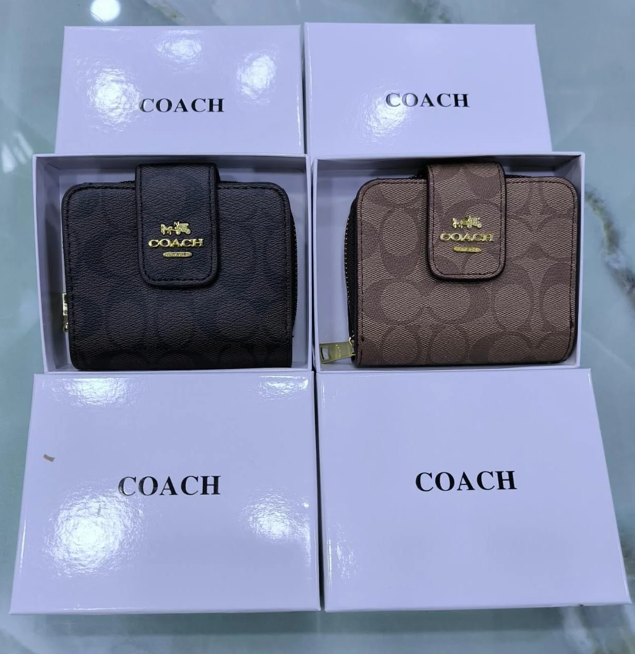 Porte monnaie coach ( mini )