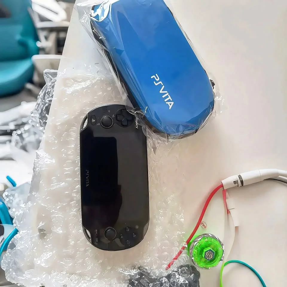 PlayStation Vita Fat OLED - Black - Ready to Play Collection