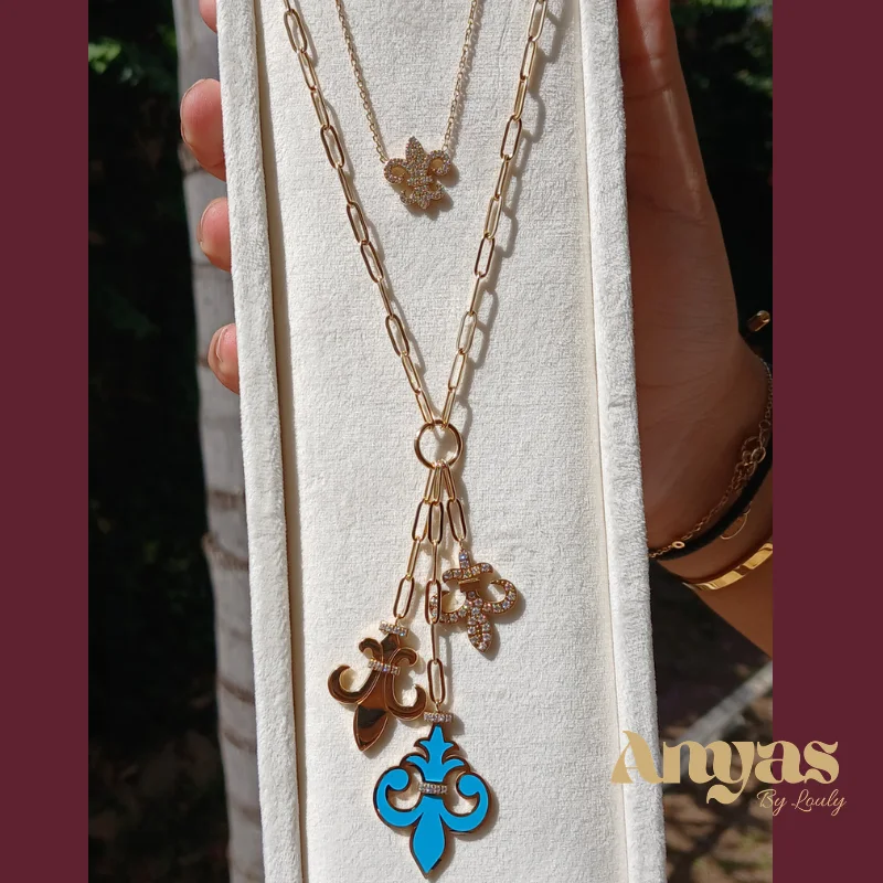 Sautoir Fleur de Lys doré avec chaîne assortie