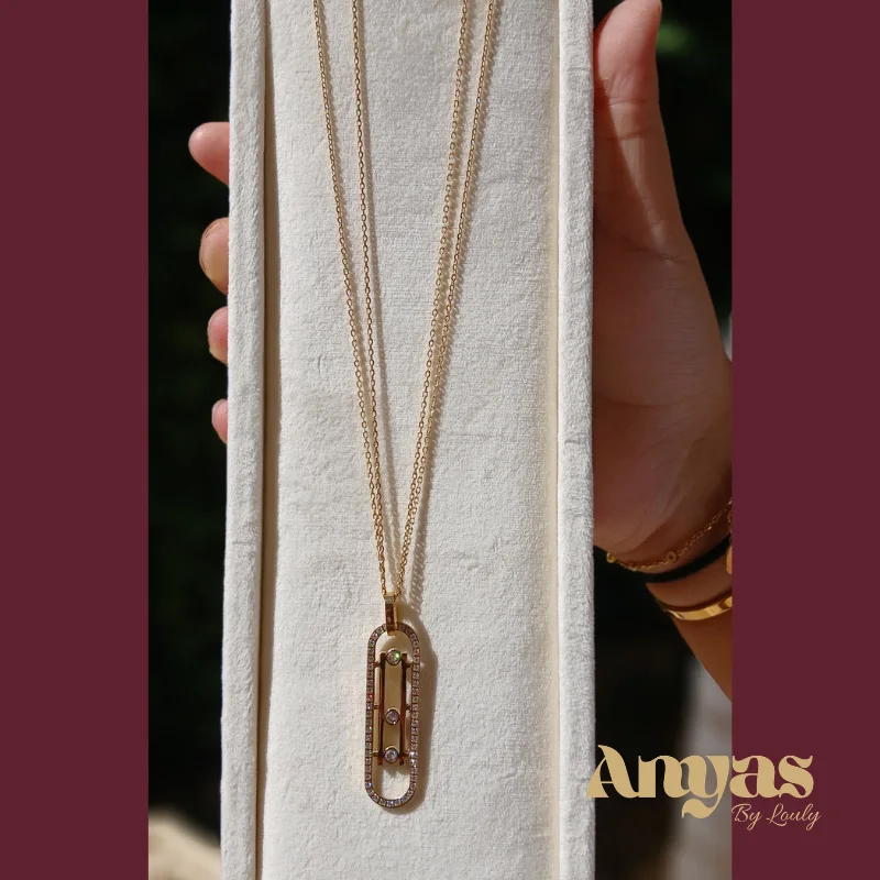 Sautoir Double Chaîne doré, pendentif ovale serti de zircons