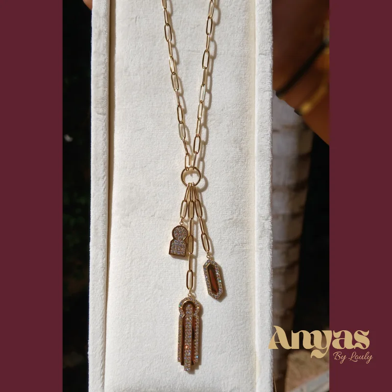 Sautoir Trois Breloques doré, serti de zircons